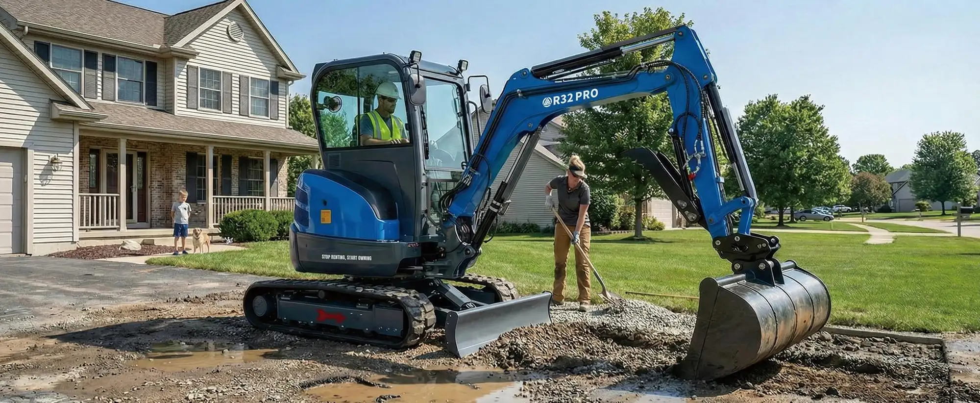 RIPPA R32 PRO mini excavator with an enclosed cab spreading gravel on a driveway